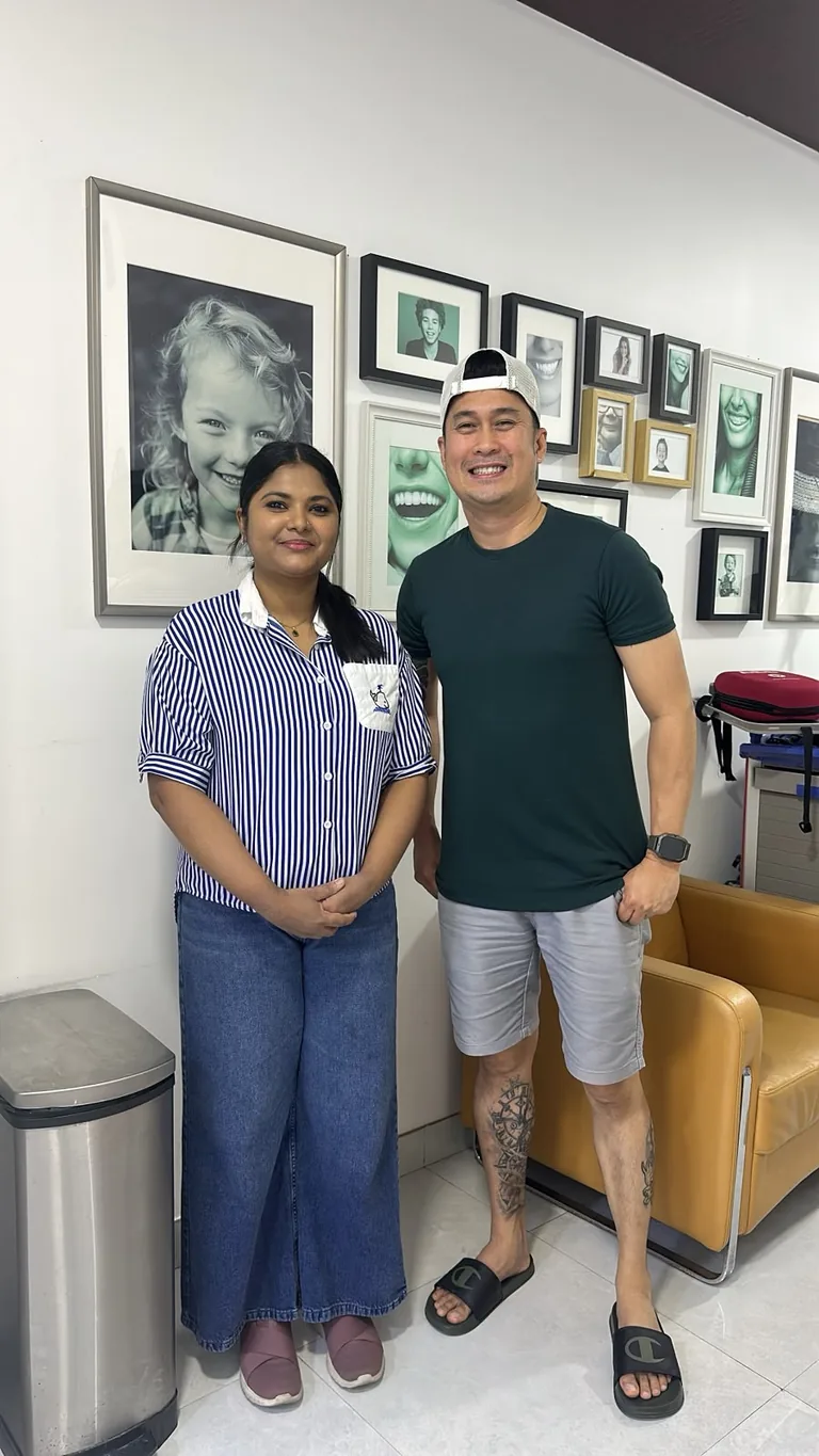 Dr Kavya Kuttichi Parakkuni, general dentist, with a patient at Best Dentist in Al Rigga, Dubai