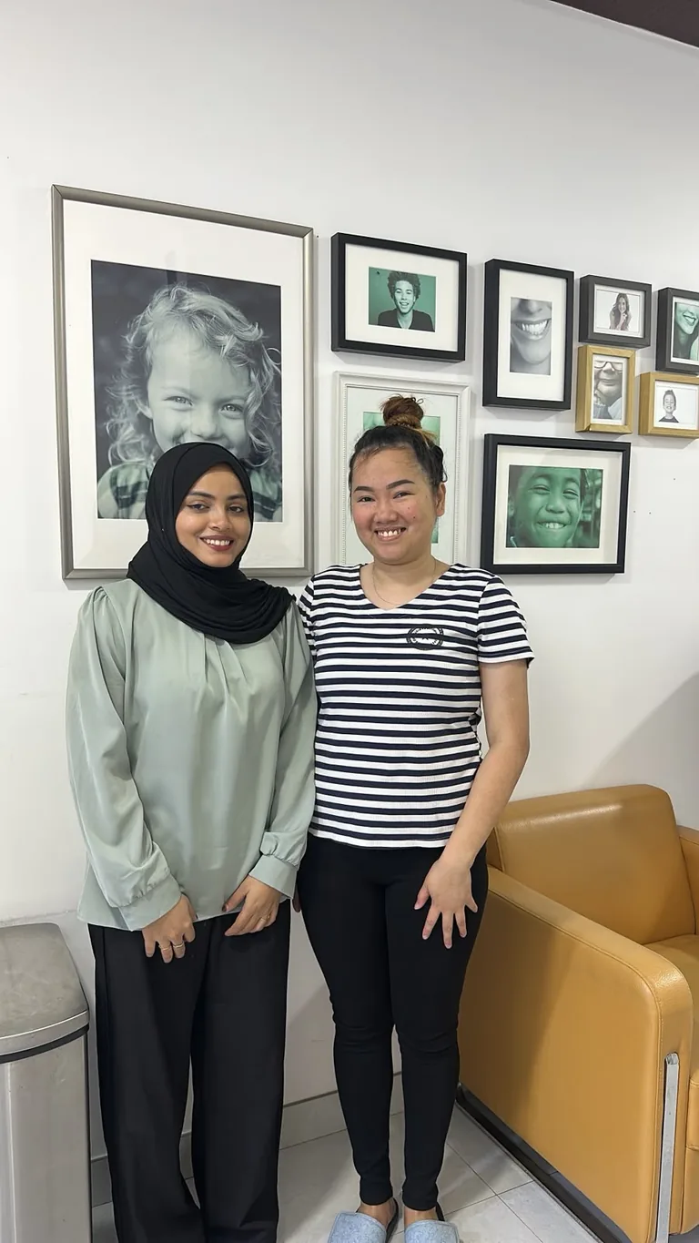 Dr Shadeeda Thesni Chekkumarakkarakath, general dentist, with a patient at Best Dentist in Al Rigga, Dubai